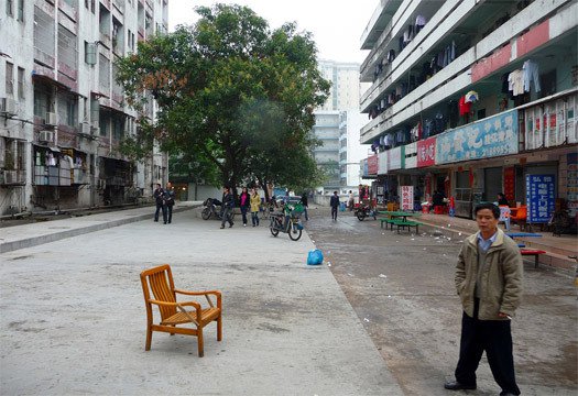 Concrete yard between factory worker dormitories, Shenzhen. [Photo by dcmaster]