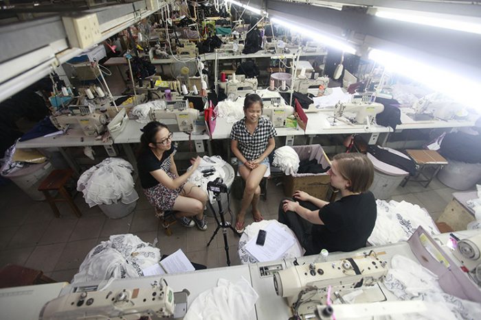 Huang (center) chatted about her beauty secrets with interpreter Zhu Lei (left) and researcher Mikaela Kvan (lower right). Photo by Daniel Huang